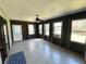 Sun Room features brick walls, ceiling fan and multiple windows for ample natural light at 5877 Nw 64Th St, Ocala, FL 34482