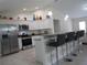 Modern kitchen with stainless steel appliances and granite countertops at 22 Juniper Pass Crse, Ocala, FL 34480