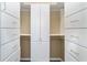 Custom walk-in closet with built-in shelving, drawers, and ample storage space at 11017 Sw 71St Cir, Ocala, FL 34476