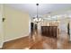 Open dining room showcases beautiful hardwood floors and open floorplan at 11017 Sw 71St Cir, Ocala, FL 34476