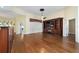 Spacious living area with hardwood floors and built-in entertainment center at 11017 Sw 71St Cir, Ocala, FL 34476