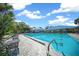 Inviting community pool with plenty of space to relax and enjoy the sun at 10820 Sw 87Th Ter, Ocala, FL 34481