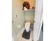 Small bathroom with toilet and shelving at 2733 Scarborough Dr, Kissimmee, FL 34744