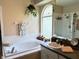 Relaxing bathroom with soaking tub and shower at 2733 Scarborough Dr, Kissimmee, FL 34744