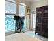 Bedroom with wood-look floors and access to exterior at 2733 Scarborough Dr, Kissimmee, FL 34744