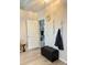 Bright entryway with coat rack and storage bench at 2733 Scarborough Dr, Kissimmee, FL 34744