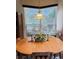 Kitchen breakfast nook with wood table and chairs at 2733 Scarborough Dr, Kissimmee, FL 34744