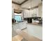 White kitchen with island, sink and appliances at 2733 Scarborough Dr, Kissimmee, FL 34744