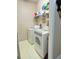 Laundry room with washer, dryer and shelving at 2733 Scarborough Dr, Kissimmee, FL 34744