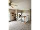 Spacious loft area overlooking the main floor with a charming window at 2733 Scarborough Dr, Kissimmee, FL 34744