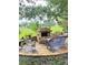 Outdoor kitchen area with stone countertops and built-in grill at 2733 Scarborough Dr, Kissimmee, FL 34744