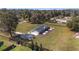 This aerial shot showcases a meticulously maintained yard in a serene neighborhood setting at 4011 Se 47Th Pl, Ocala, FL 34480