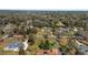 Spacious lots are seen in this aerial view highlighting the tree lined streets in a tranquil neighborhood at 4011 Se 47Th Pl, Ocala, FL 34480