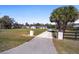 Aerial shot of a single story home with a sprawling front lawn at 4011 Se 47Th Pl, Ocala, FL 34480