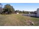 Picture of the backyard that has a storage shed, swing set, and hammock at 4011 Se 47Th Pl, Ocala, FL 34480