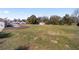Spacious backyard with potential for recreation, featuring a shed and ample room for various outdoor activities at 4011 Se 47Th Pl, Ocala, FL 34480