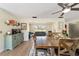 Cozy dining room with a vintage-style cabinet, wooden table set, and an open layout at 4011 Se 47Th Pl, Ocala, FL 34480