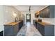 Modern kitchen featuring wood countertops, stainless steel appliances, and trendy backsplash at 4011 Se 47Th Pl, Ocala, FL 34480