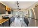 The spacious kitchen has butcher block countertops and stylish backsplash, enhancing its modern look at 4011 Se 47Th Pl, Ocala, FL 34480