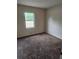 Bedroom with carpet, natural light from the window at 4 Spring Trl, Ocala, FL 34472