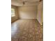 Spacious living room featuring tile floors and a ceiling fan at 4 Spring Trl, Ocala, FL 34472