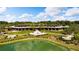 Community clubhouse near a lake and golf course at 5172 Nw 46Th Lane Rd, Ocala, FL 34482