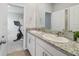 Modern bathroom with double vanity and granite countertop at 5172 Nw 46Th Lane Rd, Ocala, FL 34482