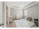 Bright Bedroom with a crib, changing table and seating at 5172 Nw 46Th Lane Rd, Ocala, FL 34482