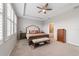 Spacious Primary bedroom with large bed and ensuite bathroom at 5172 Nw 46Th Lane Rd, Ocala, FL 34482