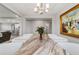 Elegant dining room featuring a large marble table and statement art at 5172 Nw 46Th Lane Rd, Ocala, FL 34482