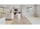 Open kitchen with island and granite countertops at 5172 Nw 46Th Lane Rd, Ocala, FL 34482