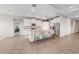 Modern kitchen with island and stainless steel appliances at 5172 Nw 46Th Lane Rd, Ocala, FL 34482