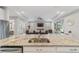 Kitchen with granite countertops and view of living room at 5172 Nw 46Th Lane Rd, Ocala, FL 34482