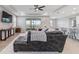 Living room with sectional sofa and access to patio at 5172 Nw 46Th Lane Rd, Ocala, FL 34482