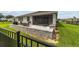 Back patio with seating area and built-in grill at 5172 Nw 46Th Lane Rd, Ocala, FL 34482