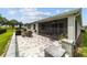 Outdoor patio with seating and built-in grill at 5172 Nw 46Th Lane Rd, Ocala, FL 34482