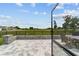 Large patio with gray pavers and view of open green space at 5172 Nw 46Th Lane Rd, Ocala, FL 34482