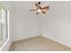 Bright room with ceiling fan and tile flooring at 8463 Sw 84Th Loop, Ocala, FL 34481