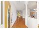Bright foyer with hardwood floors leading into the living spaces at 8463 Sw 84Th Loop, Ocala, FL 34481