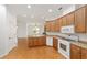 Gourmet kitchen featuring wood cabinets and modern appliances at 8463 Sw 84Th Loop, Ocala, FL 34481