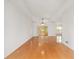 Open-concept living room featuring tray ceilings and sliding glass doors at 8463 Sw 84Th Loop, Ocala, FL 34481