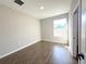 Cozy bedroom with tile flooring and a sun-filled window at 10107 Sw 41St Ave, Ocala, FL 34476