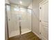 Bathroom featuring a large walk-in shower with glass enclosure and tiled walls at 10131 Sw 41St Ave, Ocala, FL 34476