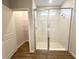 Bathroom featuring a large walk-in shower with glass enclosure and adjacent walk-in closet at 10131 Sw 41St Ave, Ocala, FL 34476