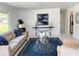 Inviting living room with contemporary decor, stylish rug, and ample natural light at 11 Cedar Trace Crse, Ocala, FL 34472