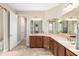Large bathroom featuring dual sinks and lots of drawers and countertop space at 8445 Sw 93Rd Cir, Ocala, FL 34481