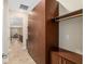 Built in closet with storage cabinets and tiled flooring, situated near the kitchen at 8445 Sw 93Rd Cir, Ocala, FL 34481