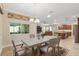 Bright dining room with a view into the living room and kitchen at 8445 Sw 93Rd Cir, Ocala, FL 34481