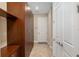 Hallway with closet cabinets offering ample storage space and tiled flooring at 8445 Sw 93Rd Cir, Ocala, FL 34481