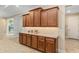 Well-equipped kitchen featuring countertops, stainless steel appliances, and custom cabinetry at 8445 Sw 93Rd Cir, Ocala, FL 34481